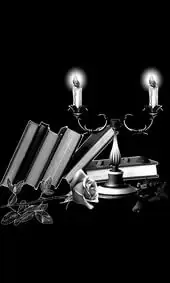 Гравировка на памятник с канделябром среди книг и розой